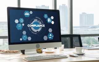 Digital dashboard displaying customer communication compliance metrics on a modern office desk